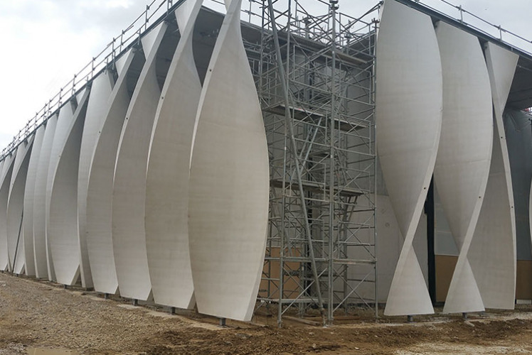 Precast concrete facade of multi-sports hall building for a polytechnique school in France.France